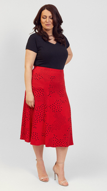 Long women's red skirt with black dots