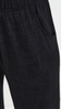 Black women's wide, loose trousers with jeans-style pockets