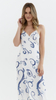 Women's white pareo cap and maxi beach dress