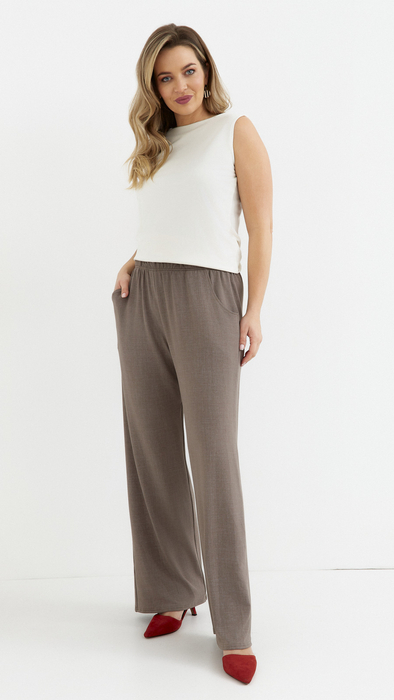 Beige women's wide, loose trousers with pockets