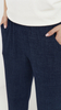 Navy blue women's wide, loose trousers with jeans-style pockets