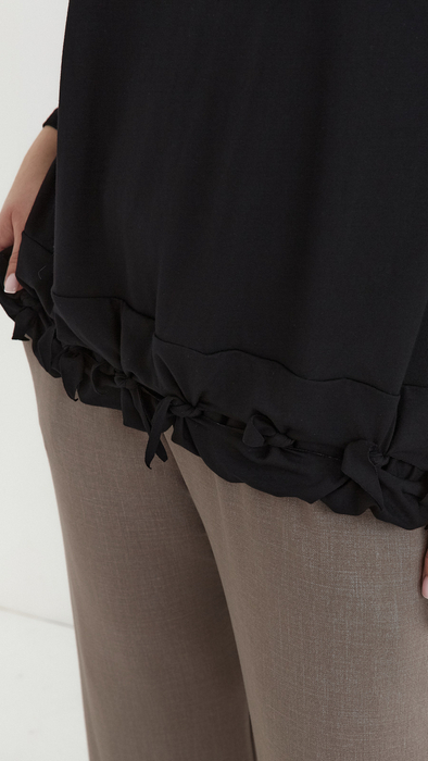 Black women's loose, elegant blouse with an application