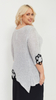 Light gray women's elegant tunic decorated with flowers