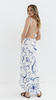 Women's white pareo cap and maxi beach dress