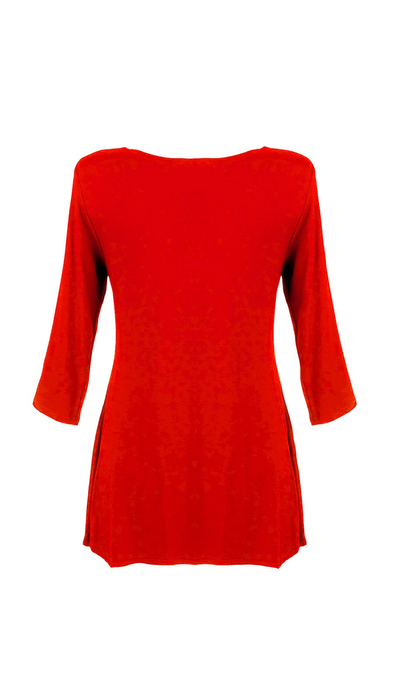 Red women's tunic decorated with a unique braid made of trimmings