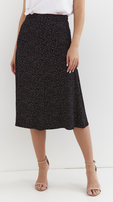 Long women's polka dot flared skirt
