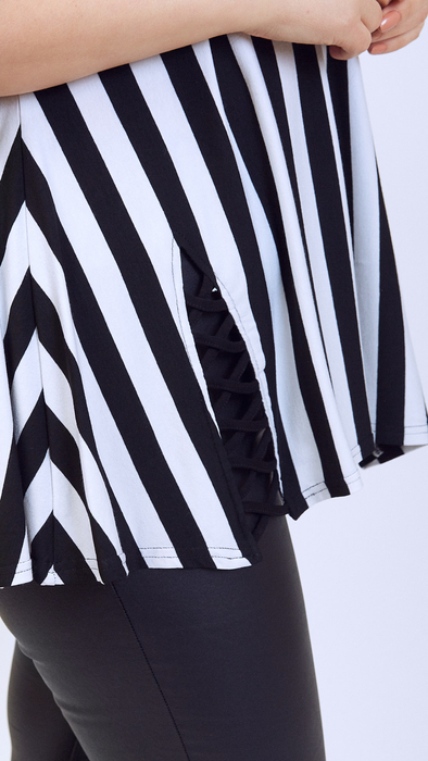 Black and white elegant women's tunic decorated with a unique braid with trimmings