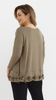 Khaki women's loose, elegant blouse with an application