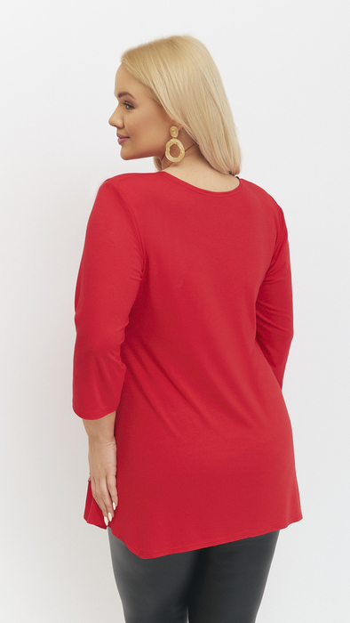 Red women's tunic decorated with a unique braid made of trimmings