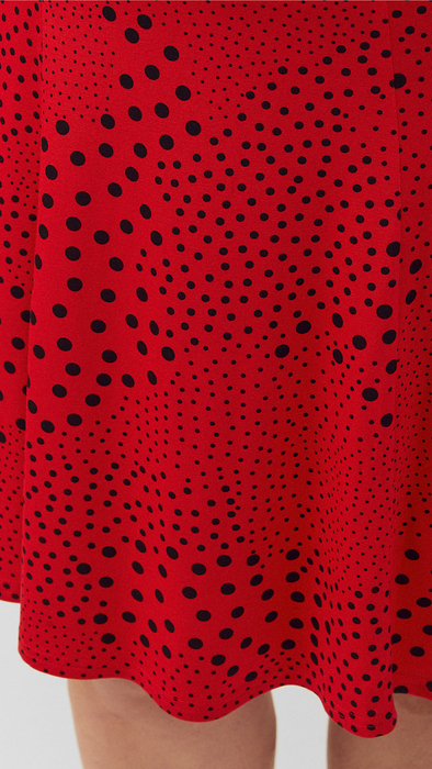 Women's red short skirt with black dots